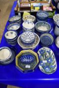 KITCHEN WARES, MAINLY POLISH BOLESLAWIECZ POTTERY ITEMS WITH FLORAL DESIGNS