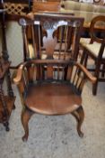 LOW ELBOW CHAIR WITH CARVED DECORATION, HEIGHT APPROX 83CM