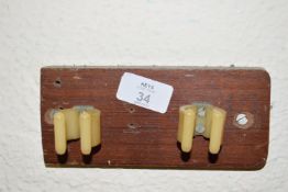 Wall mounted two-cue holder