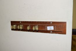 Wall mounted snooker cue rack, width approx 40cm