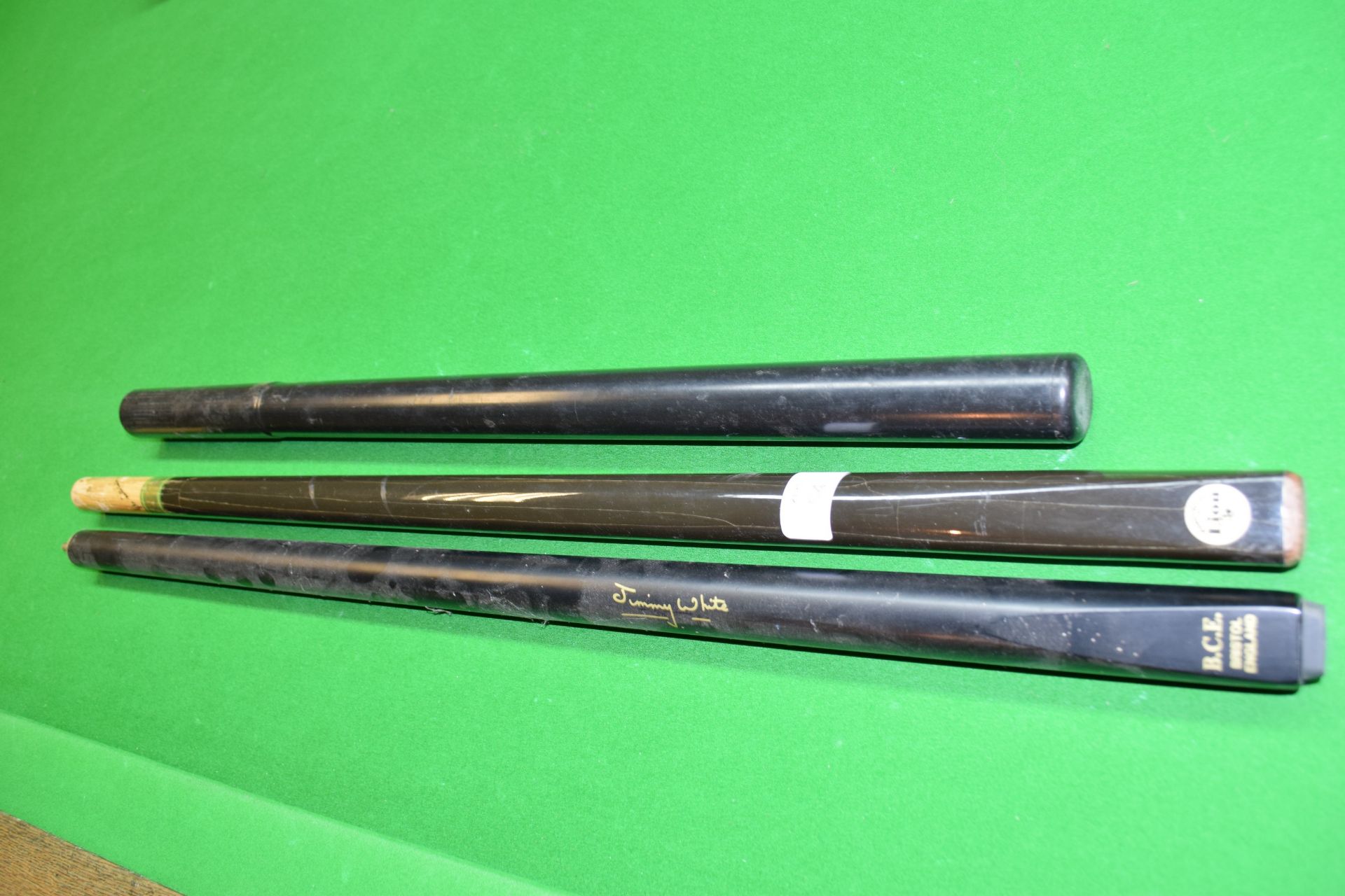 Signature part Jimmy White snooker cue, and a further part snooker cue and a cue extender