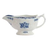 Lowestoft porcelain cream boat, the body impressed with a floral design enclosing a printed design