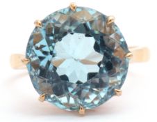 Mid 20th century aquamarine single stone ring of circular faceted shape, multi-claw set, 14.18mm