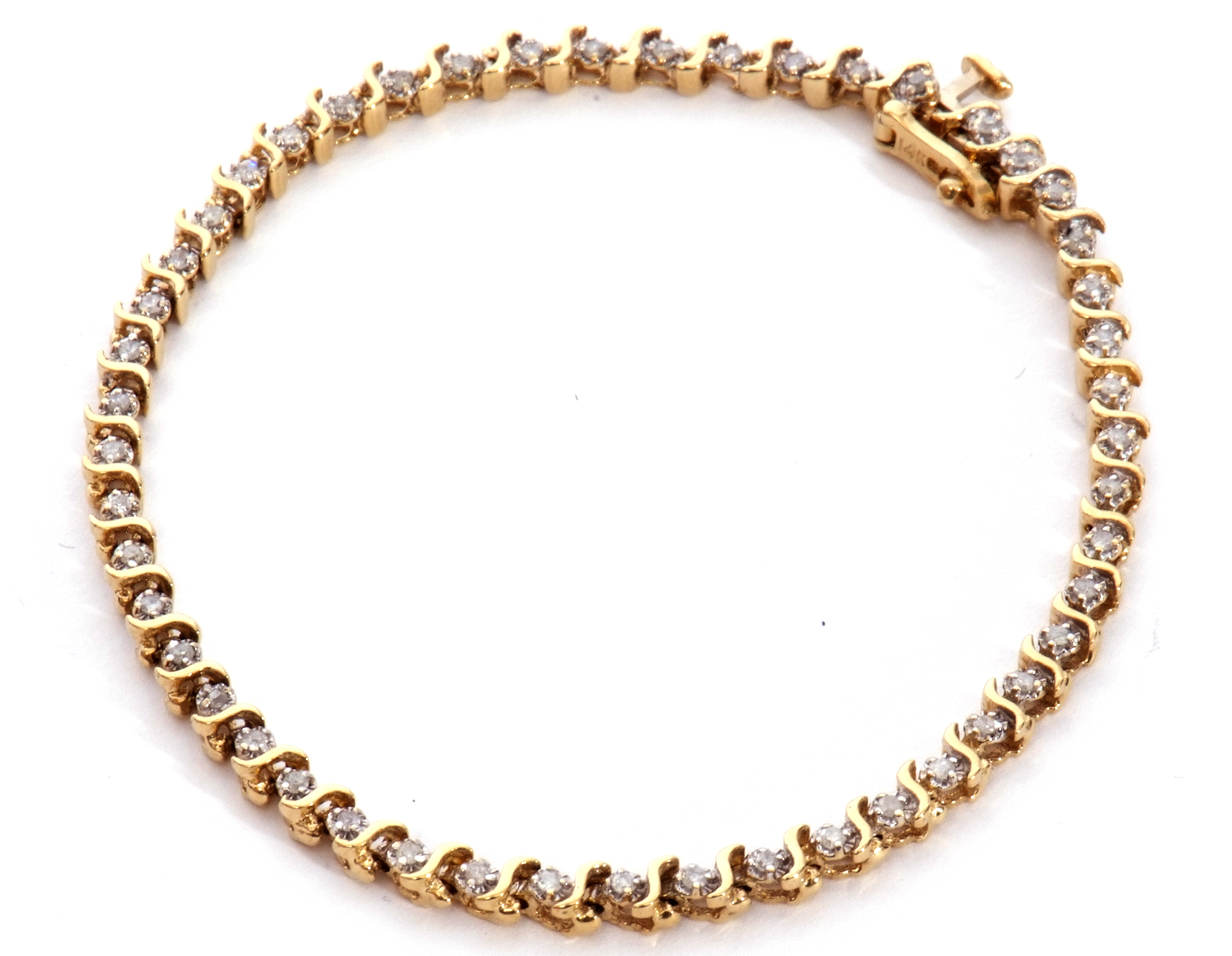 Diamond "tennis" bracelet featuring 49 small diamonds, individually claw set between S-links,