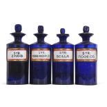 Group of four mid/late 19th century blue glass drug jars and stoppers, (4)