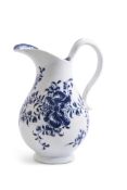 Lowestoft porcelain milk jug decorated in underglaze blue with a design of trailing flowers with