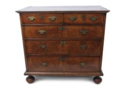 Late 17th/early 18th century walnut chest, the inlaid top over two short and three full width