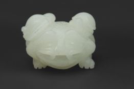 Pale jadeite model of a frog with tortoise on its back