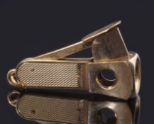 Late 20th century hallmarked 9ct gold encased cigar cutter with engine turned grips and ringlet