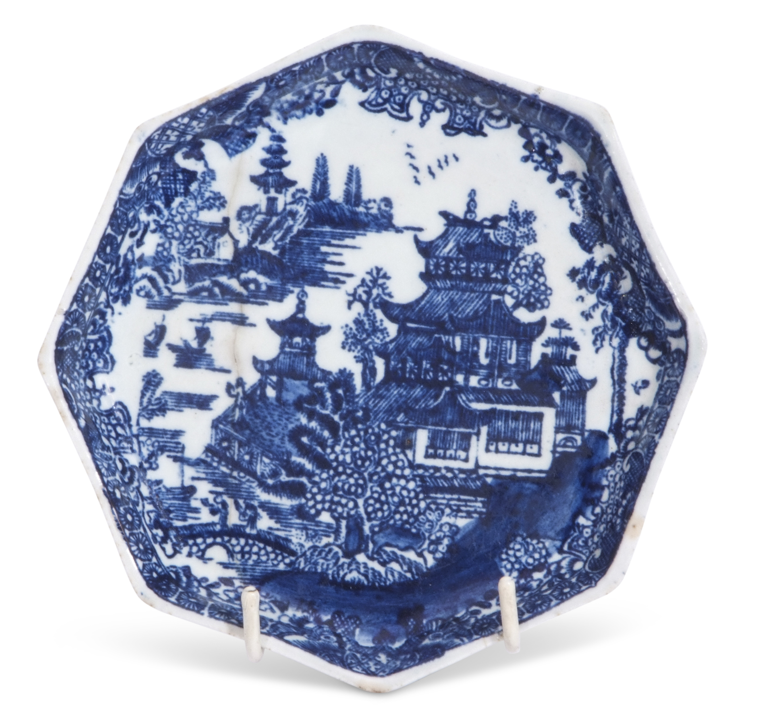 Lowestoft porcelain tea pot stand decorated in underglaze blue with a printed design of pagoda or