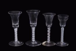 Group of four air twist and opaque twist wine glasses, tallest 18cm high (some chips) (4)