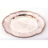 Elizabeth II silver presentation salver, circular form with gadrooned shaped border applied with