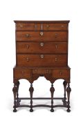 18th/19th century oak chest on stand in William & Mary style, the top section of two short and three