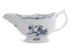 Large Lowestoft porcelain sauce boat, the body with an impressed design of flowers enclosing