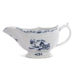Large Lowestoft porcelain sauce boat, the body with an impressed design of flowers enclosing