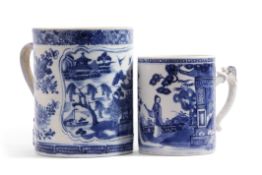 Two 18th century Chinese export tankards decorated with blue and white designs, the largest 15cm