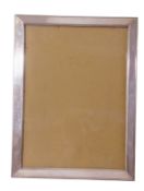 George V silver large photograph frame with plain silver border with easel and wooden backing,