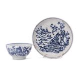 Lowestoft porcelain tea bowl and saucer decorated in underglaze blue with a printed design of a