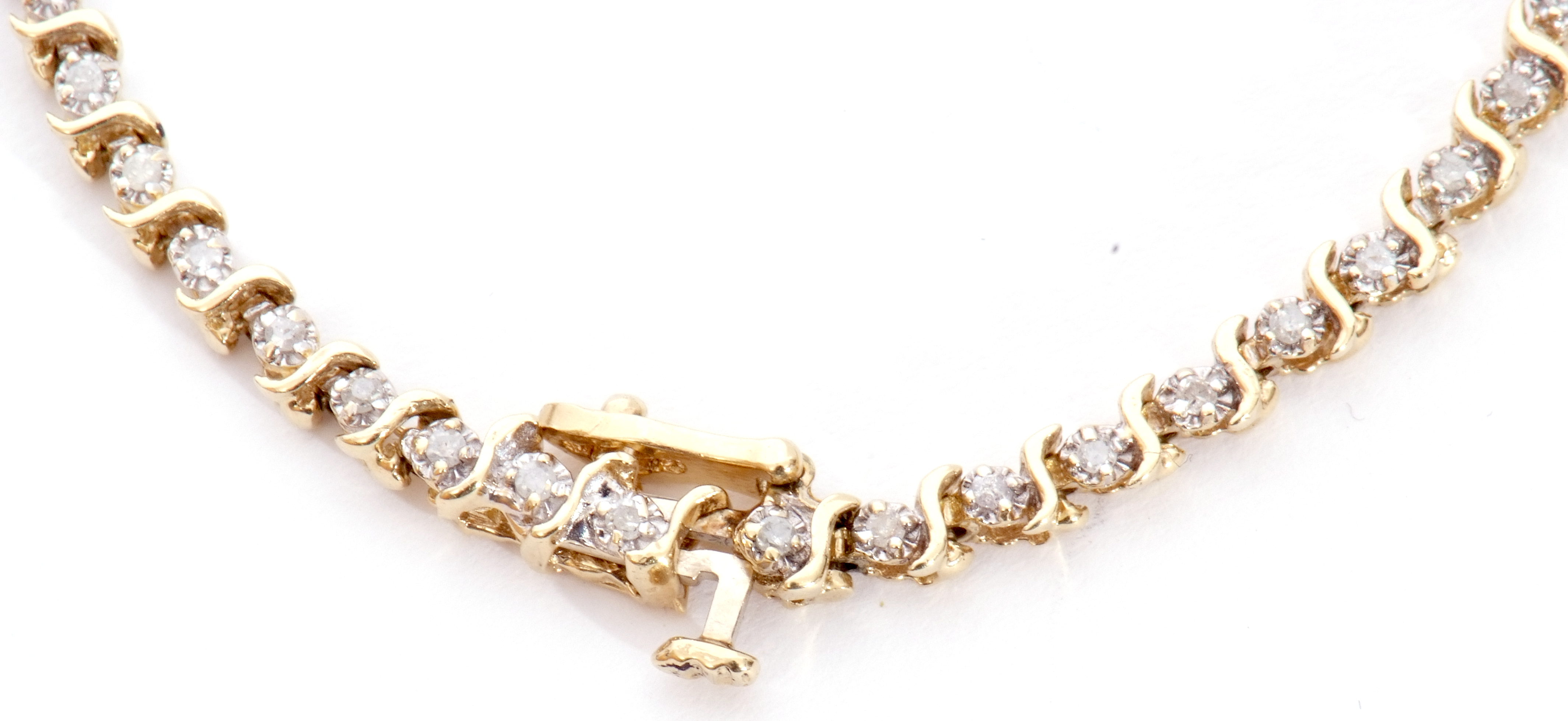 Diamond "tennis" bracelet featuring 49 small diamonds, individually claw set between S-links, - Image 4 of 9