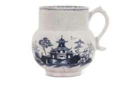 Lowestoft porcelain cider mug decorated in underglaze blue with a pagoda with island scene verso,