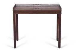 19th century mahogany silver table having Gothic tracery raised gallery, blind fret cut friezes to
