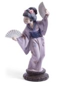 Lladro figure of an Oriental girl as a fan dancer on circular base, impressed 4991, 27cm high