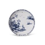 Lowestoft porcelain saucer dish decorated with a chinoiserie river scene, the border with small