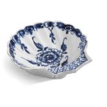 Lowestoft porcelain shell dish with scalloped rim, decorated in underglaze blue with a floral design