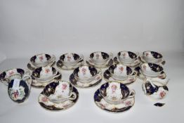 PART ENGLISH PORCELAIN TEA SET BY ROYAL WORCESTER, PLUS A BOOTH'S WORCESTER STYLE JUG (A/F)