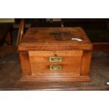 WELLINGTON STYLE OAK STATIONERY BOX, COMPRISING TWO DRAWERS BENEATH LIFT TOP SECTION, MOUNTED WITH