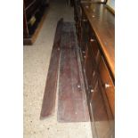 TWO LONG VINTAGE LENGTHS OF TIMBER, PRESUMED TO BE A SCHOOL BENCH AND LONG SCHOOL DESK, APPROX