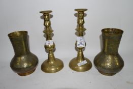 PAIR OF BRASS CANDLESTICKS AND MIDDLE EASTERN STYLE BRASS VASES