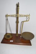 SET OF BRASS SCALES ON WOODEN MOUNT