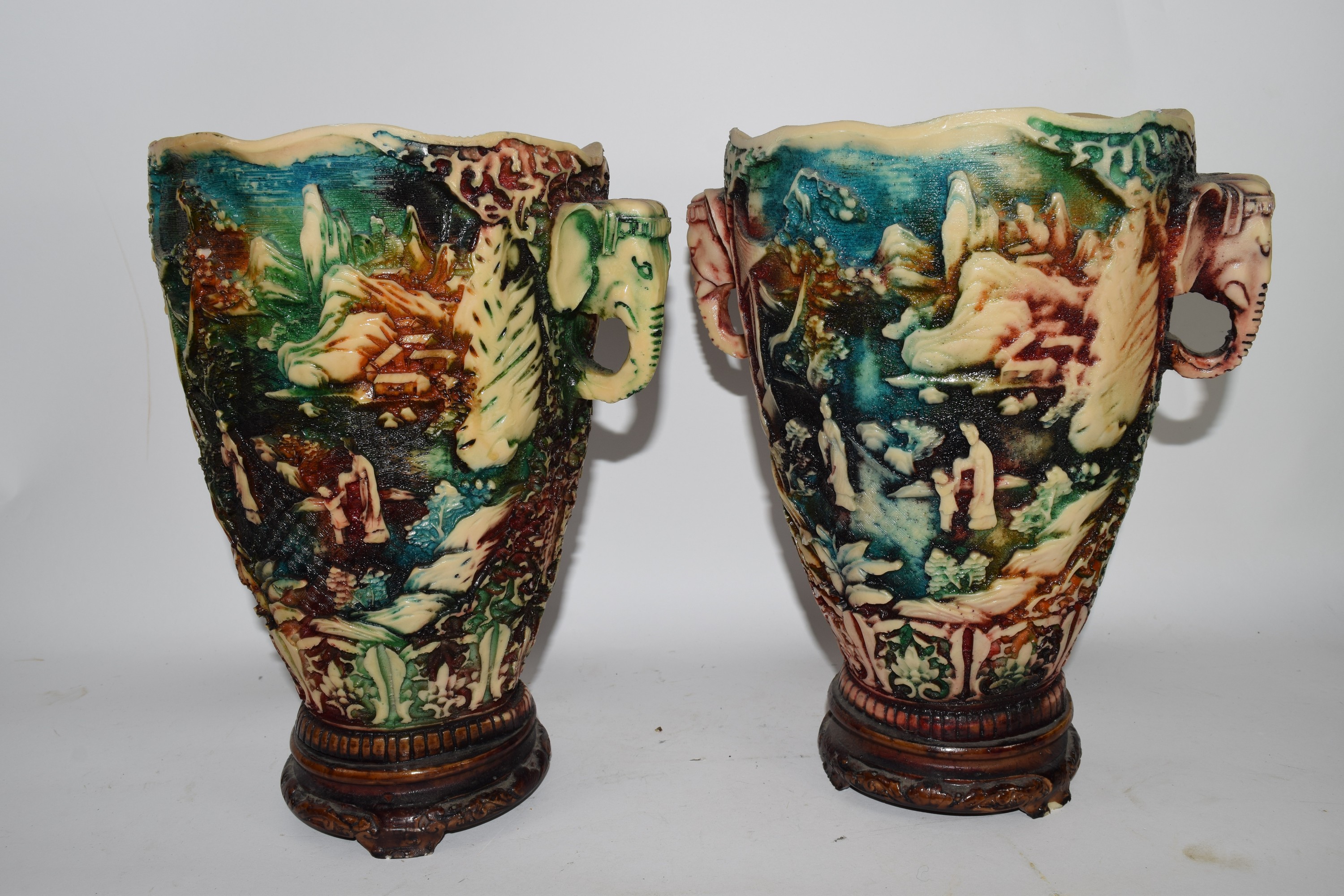 PAIR OF POTTERY VASES WITH ELEPHANT HANDLES