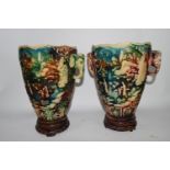 PAIR OF POTTERY VASES WITH ELEPHANT HANDLES