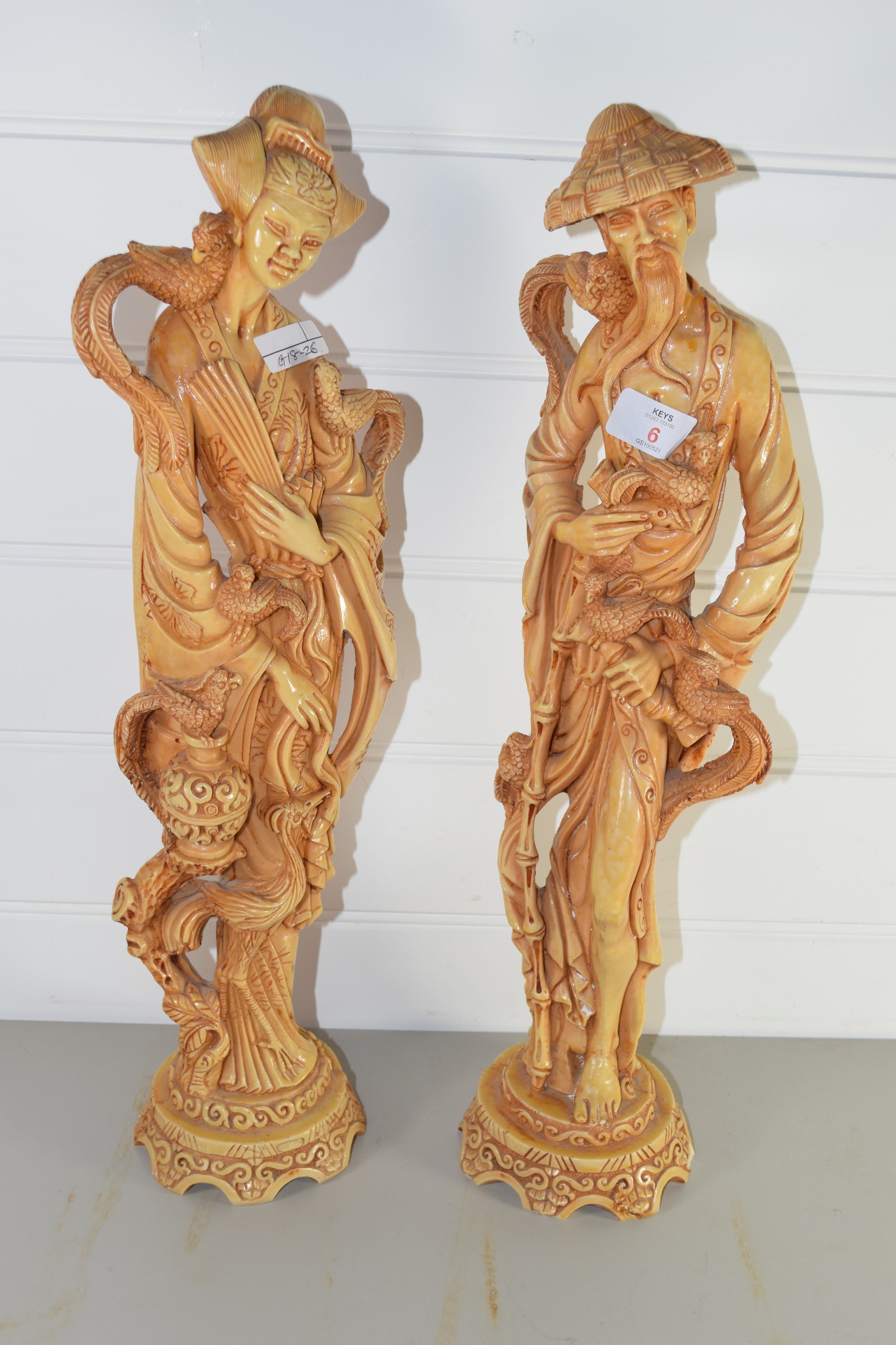 PAIR OF ORIENTAL FIGURES MODELLED IN RESIN