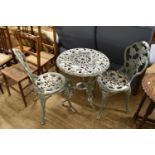 METAL GARDEN TABLE TOGETHER WITH TWO MATCHING CHAIRS, THE TABLE APPROX 56CM DIAM
