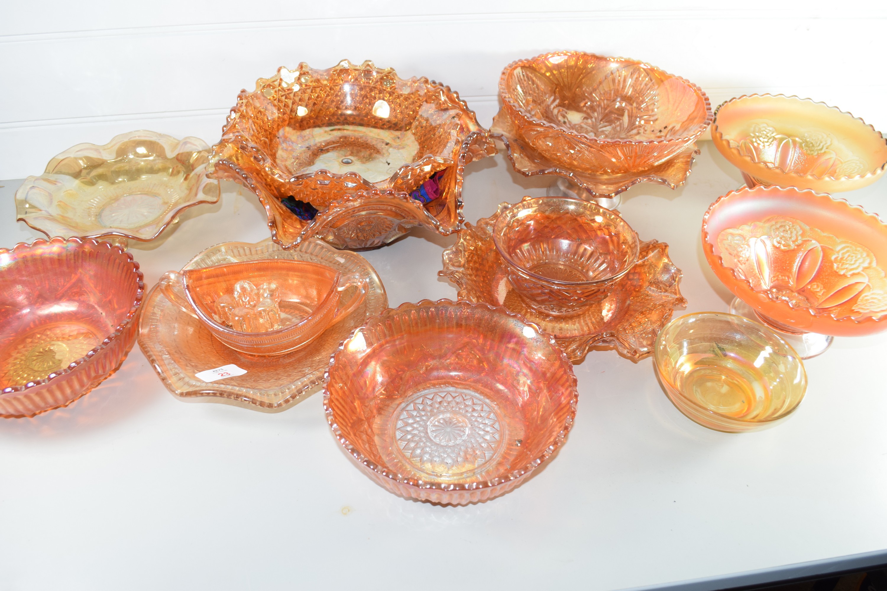 BOX CONTAINING CARNIVAL GLASS, TANGERINE COLOURED WITH FLORAL DESIGNS