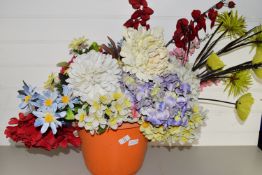 SPRAY OF ARTIFICIAL FLOWERS IN TERRACOTTA STYLE POT