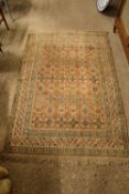 RUG DECORATED WITH GEOMETRIC SHAPES WITHIN A CENTRAL PANEL, APPROX 173 X 116CM