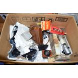 BOX CONTAINING CAMERA EQUIPMENT INCLUDING AN AGIFOLD CAMERA IN LEATHER CASE