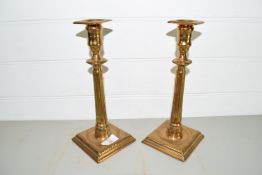 PAIR OF METAL CANDLESTICKS