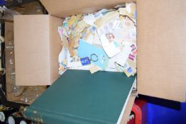 BOX CONTAINING LOOSE STAMPS AND AN ALBUM