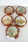 FIVE PRATT WARE LIDS IN WOODEN FRAMES