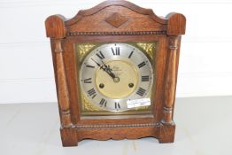 OAK MANTEL CLOCK WITH GILT DIAL WITH ROMAN NUMERALS