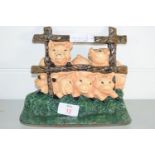 DOORSTOP MODELLED AS A FAMILY OF PIGS