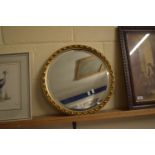 CIRCULAR MIRROR IN GILT FRAME