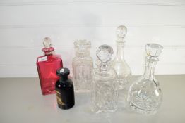 CUT GLASS DECANTERS INCLUDING ONE RED GLASS AND FURTHER SMALL DARK GLASS JAR WITH BIBA MOTIF