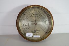 BAROMETER IN CIRCULAR OAK FRAME