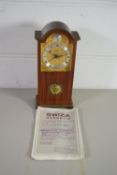 BOX CONTAINING SMALL CLOCK IN WOODEN CASE